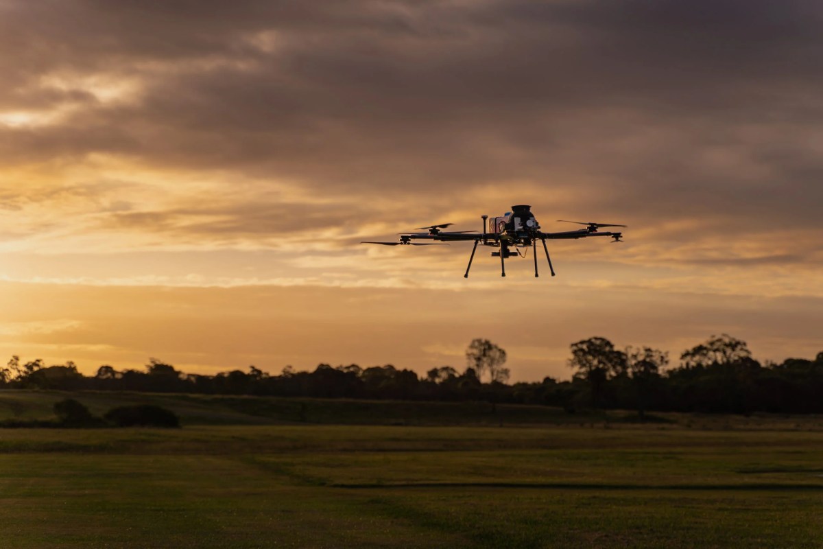 Picture of Evolution Flight's Long Range and Long Endurance ScanLift UAV Orbit hovering during dusk.