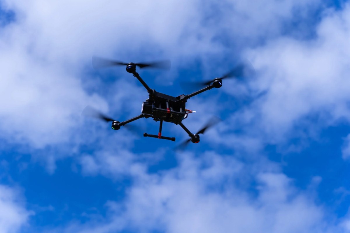Image of Evolution Flight's ScanLift Mini UAV flying.